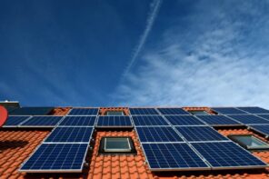 Progressing to Home Solar: Challenges and Tips. The modern panels installed at the orange shingle roof