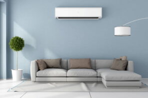 Beginner's Guide: How to Install a Mini Split Heat Pump. Ascetic Scandinavian interior with angular sofa and blue walls in the living